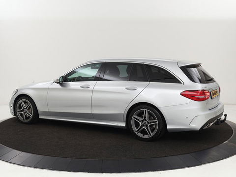 Mercedes-Benz C-Klasse 180 Business Solution AMG | Stoelverwarming | 360 Camera | Trekhaak | Digital Cockpit | Leder/Alcantara | Full LED | Navigatie | Park Assist