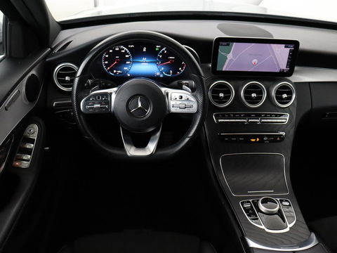 Mercedes-Benz C-Klasse 180 Business Solution AMG | Stoelverwarming | 360 Camera | Trekhaak | Digital Cockpit | Leder/Alcantara | Full LED | Navigatie | Park Assist