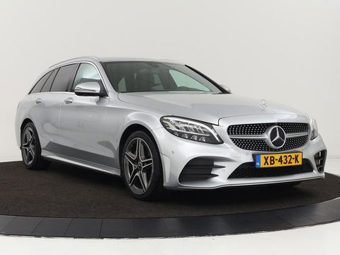 Mercedes-Benz C-Klasse 180 Business Solution AMG | Stoelverwarming | 360 Camera | Trekhaak | Digital Cockpit | Leder/Alcantara | Full LED | Navigatie | Park Assist