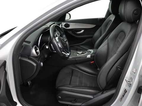 Mercedes-Benz C-Klasse 180 Business Solution AMG | Stoelverwarming | 360 Camera | Trekhaak | Digital Cockpit | Leder/Alcantara | Full LED | Navigatie | Park Assist