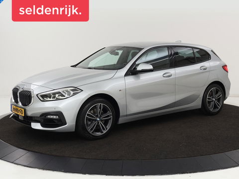BMW 1-serie 118i M Sport | Trekhaak | Carplay | Navigatie | Sportstoelen | Half leder | Full LED | Climate control | Parkeerhulp