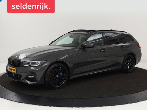 BMW 3-serie 320e M-Sport | Panoramadak | Adaptive cruise | Leder | Trekhaak | Head-Up | Camera | Stoel & stuurverwarming | Carplay | Navigatie | Sfeerverlichting | Live Cockpit
