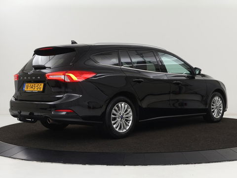 Ford Focus 1.0 EcoBoost Titanium X | Stoel & stuurverwarming | Trekhaak | Adaptive cruise | Camera | Full LED | Carplay | B&O Sound | Digital Cockpit | Keyless | Climate control