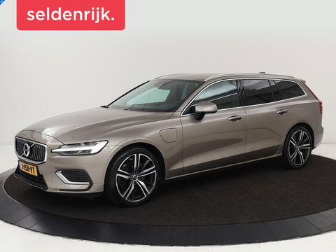 Volvo V60 2.0 T6 Recharge AWD Business Pro | Leder | Trekhaak | Stoel & stuurverwarming | Camera | Adaptive cruise | Achterbankverwarming | Carplay | Keyless | Full LED | Navigatue | PHEV