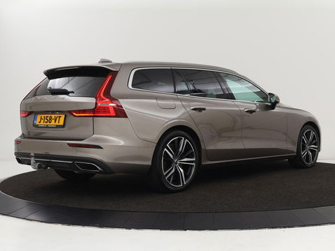 Volvo V60 2.0 T6 Recharge AWD Business Pro | Leder | Trekhaak | Stoel & stuurverwarming | Camera | Adaptive cruise | Achterbankverwarming | Carplay | Keyless | Full LED | Navigatue | PHEV
