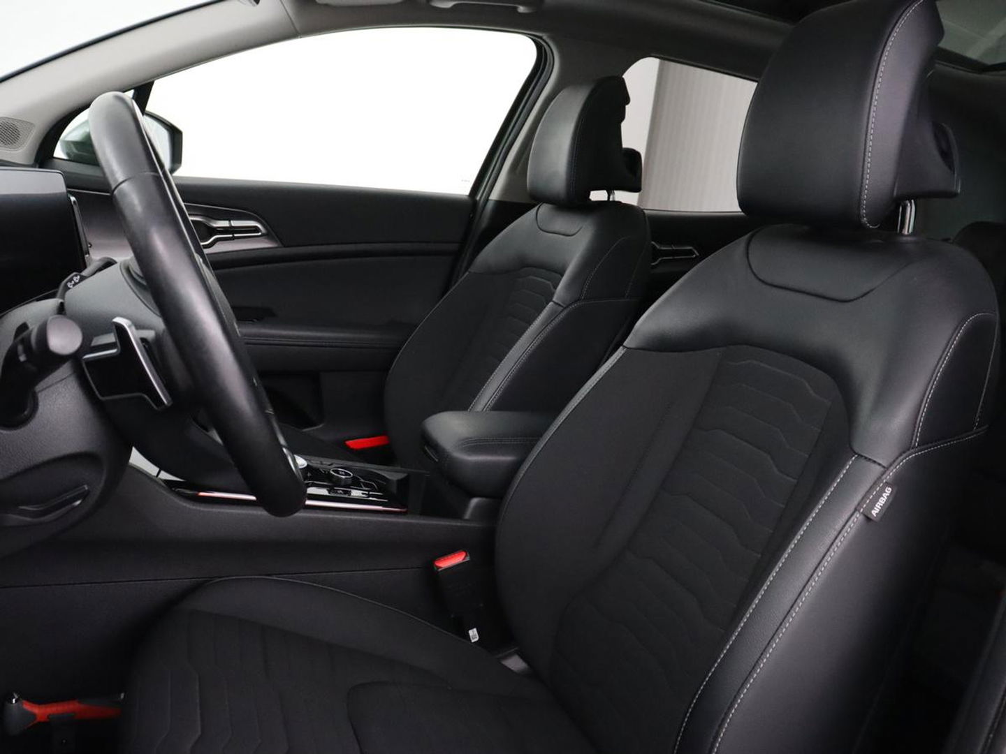 Kia Sportage 1.6 T-GDi Hybrid DynamicPlusLine | Panoramadak | Matrix LED | Trekhaak | Half leder | Adaptive cruise | Stoel & stuurverwarming | Camera | Carplay | Keyless | Navigatie