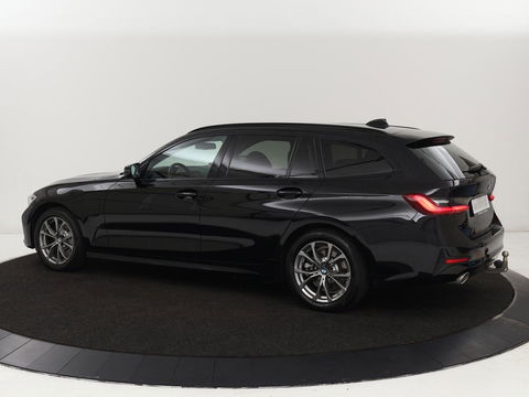 BMW 3-serie 330e Sport Line | Stoel & stuurverwarming | Adaptive cruise | Trekhaak | Sportstoelen | Carplay | Sfeerverlichting | Half leder | Navigatie | Full LED | PHEV