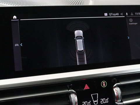 BMW 3-serie 330e Sport Line | Stoel & stuurverwarming | Adaptive cruise | Trekhaak | Sportstoelen | Carplay | Sfeerverlichting | Half leder | Navigatie | Full LED | PHEV