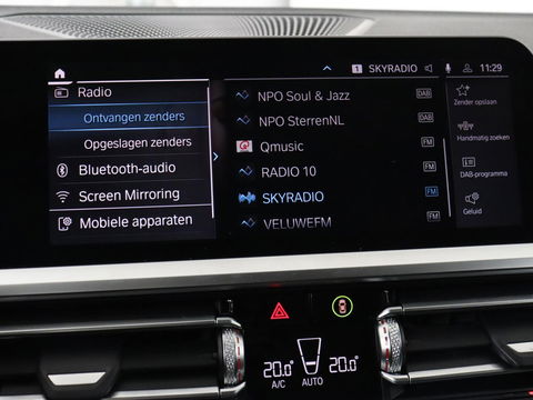 BMW 3-serie 330e Sport Line | Stoel & stuurverwarming | Adaptive cruise | Trekhaak | Sportstoelen | Carplay | Sfeerverlichting | Half leder | Navigatie | Full LED | PHEV