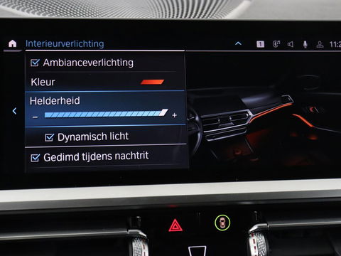 BMW 3-serie 330e Sport Line | Stoel & stuurverwarming | Adaptive cruise | Trekhaak | Sportstoelen | Carplay | Sfeerverlichting | Half leder | Navigatie | Full LED | PHEV