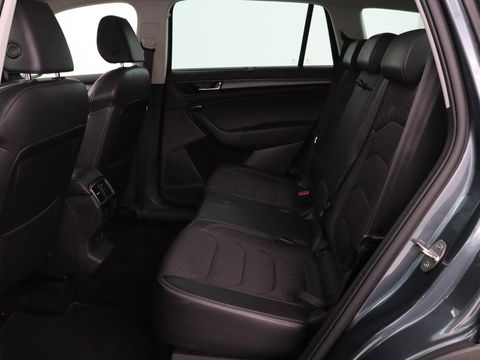 Škoda Kodiaq 1.5 TSI Business Edition | Panoramadak | Stoelverwarming | Adaptive cruise | Trekhaak | Virtual Cockpit | Canton Sound | Keyless | Camera | Navigatie | Carplay | 19'' lichtmetalen velgen