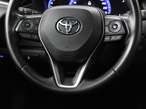 Toyota Corolla 1.8 Hybrid Dynamic | Stoelverwarming | Trekhaak | Camera | Adaptive cruise | Carplay | Navigatie | Parkeerhulp | Climate control