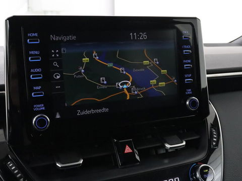 Toyota Corolla 1.8 Hybrid Dynamic | Stoelverwarming | Trekhaak | Camera | Adaptive cruise | Carplay | Navigatie | Parkeerhulp | Climate control
