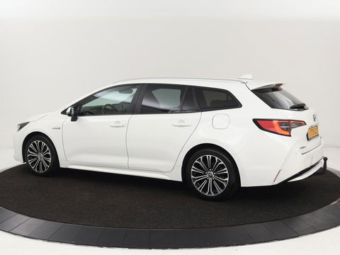 Toyota Corolla 1.8 Hybrid Dynamic | Stoelverwarming | Trekhaak | Camera | Adaptive cruise | Carplay | Navigatie | Parkeerhulp | Climate control