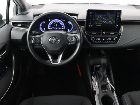 Toyota Corolla 1.8 Hybrid Dynamic | Stoelverwarming | Trekhaak | Camera | Adaptive cruise | Carplay | Navigatie | Parkeerhulp | Climate control
