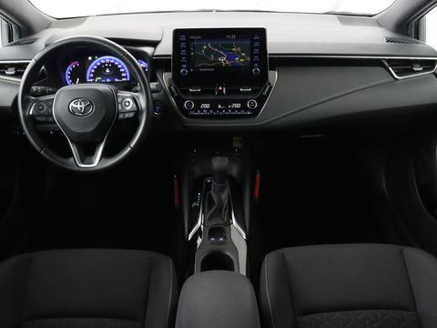 Toyota Corolla 1.8 Hybrid Dynamic | Stoelverwarming | Trekhaak | Camera | Adaptive cruise | Carplay | Navigatie | Parkeerhulp | Climate control