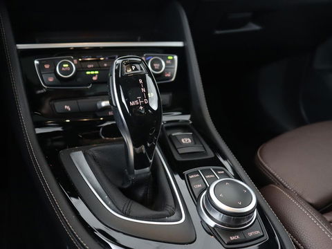 BMW 2 Serie Gran Tourer 220i 7-persoons High Executive Edition | Panoramadak | Leder | Stoelverwarming | Trekhaak | Head-Up | Camera | Sport Line | Sportstoelen | Navigatie | Full LED