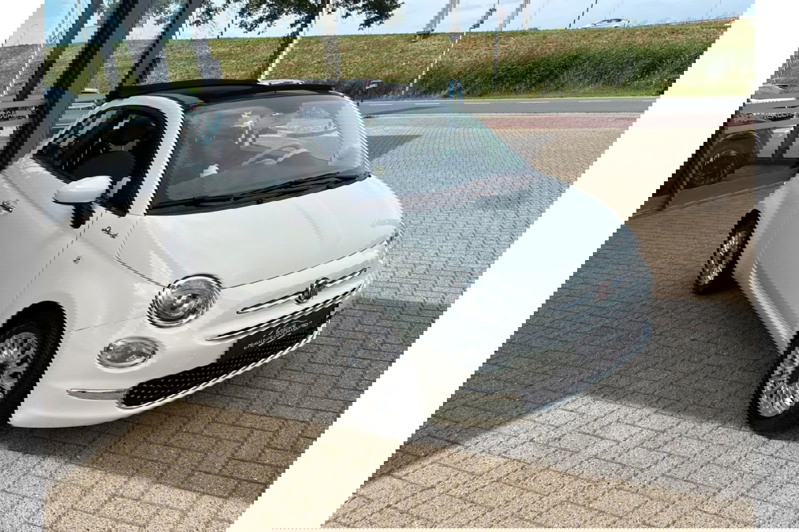 Fiat 500C 1.0 HYBRID DOLCEVITA AIRCO CRUISE PDC CARPLAY.