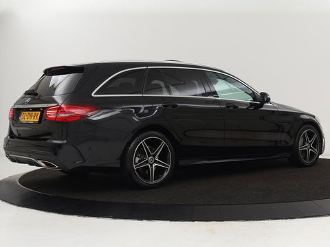 Mercedes-Benz C-Klasse 300e AMG | Stoelventilatie | Panoramadak | Leder | Burmester | Memory | Luchtvering | Carplay | Stoelverwarming | Navigatie | Full LED