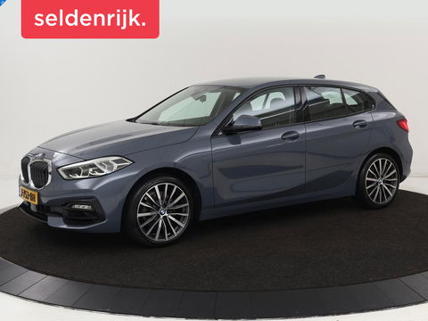 BMW 1-serie 118i Executive Edition | Sport Line | Carplay | Sportstoelen | Half leder | Live Cockpit | Climate control | Parkeerhulp | Cruise control | 'Storm Bay' Metallic