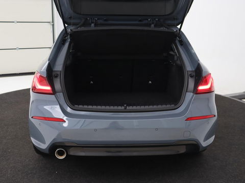 BMW 1-serie 118i Executive Edition | Sport Line | Carplay | Sportstoelen | Half leder | Live Cockpit | Climate control | Parkeerhulp | Cruise control | 'Storm Bay' Metallic