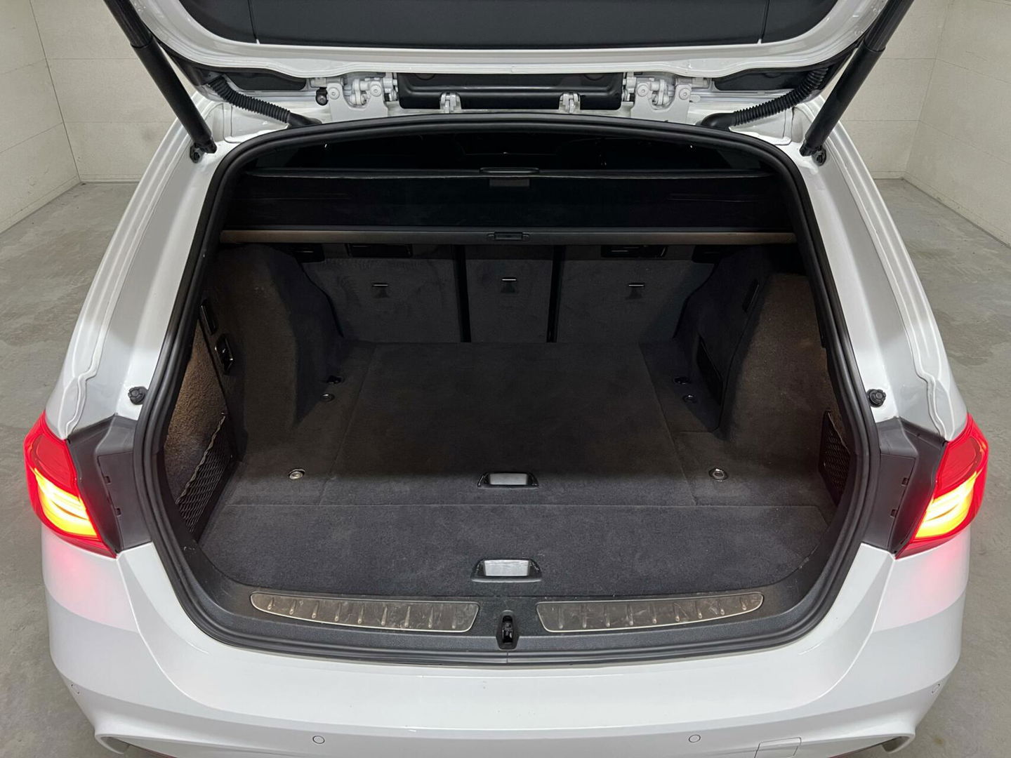 BMW 3 Serie Touring 318i M-Sport Navi Cruise Leer NAP