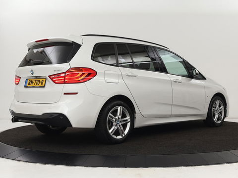 BMW 2 Serie Gran Tourer 218i M Sport 7-persoons | Panoramadak | Leder | Stoelverwarming | Trekhaak | Camera | Full LED | Sportstoelen | Navigatie | Park Assist