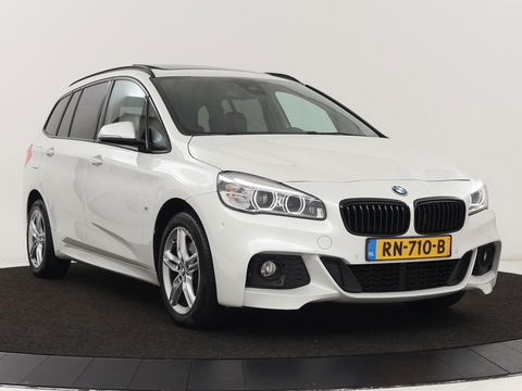 BMW 2 Serie Gran Tourer 218i M Sport 7-persoons | Panoramadak | Leder | Stoelverwarming | Trekhaak | Camera | Full LED | Sportstoelen | Navigatie | Park Assist