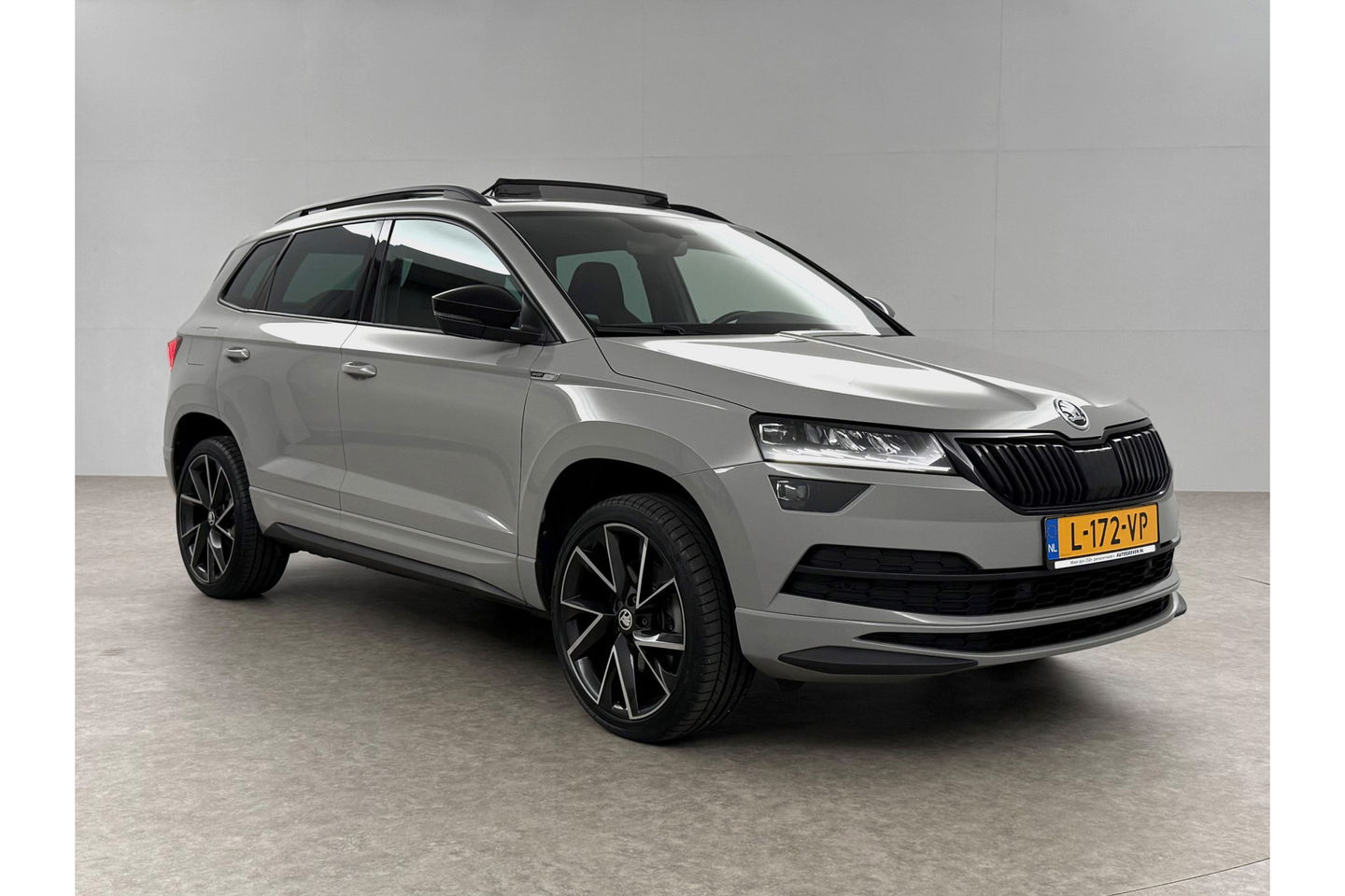 Škoda Karoq 1.5 TSI ACT 150PK Sportline Pano Sfeer Carplay Virtual Camera LED Clima Cruise Navi PDC 19''LMV