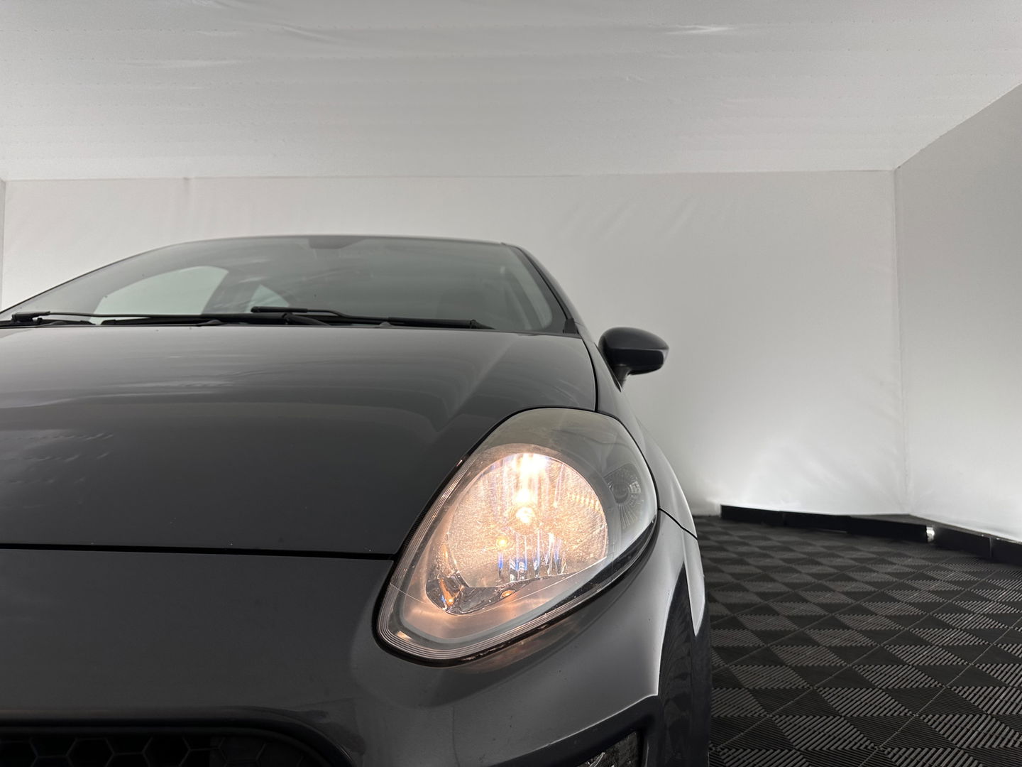 Fiat Punto Evo 1.3 M-Jet Lounge *AIRCO | CRUISE | MICROFIBRE-SPORTSEATS | RADIO-CD | SIDE-SKIRTS | PRIVACY-GLASS |  16''ALU*