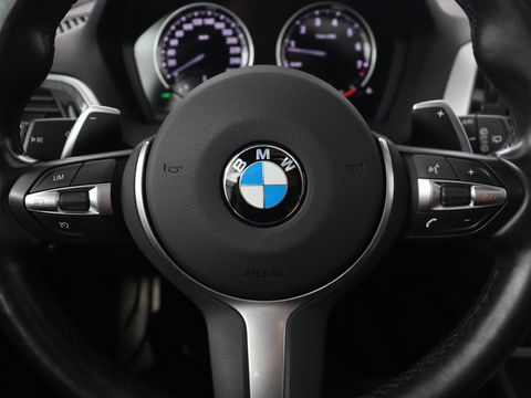 BMW 1-serie M140i High Executive | 2e eigenaar | Schuifdak | Leder | Harman/Kardon | Stoel & stuurverwarming | Camera | Carplay | Full LED | Navigatie
