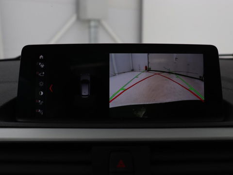 BMW 1-serie M140i High Executive | 2e eigenaar | Schuifdak | Leder | Harman/Kardon | Stoel & stuurverwarming | Camera | Carplay | Full LED | Navigatie