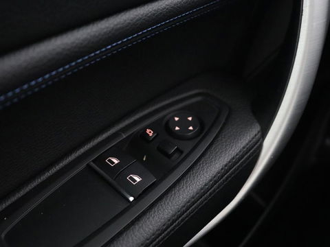BMW 1-serie M140i High Executive | 2e eigenaar | Schuifdak | Leder | Harman/Kardon | Stoel & stuurverwarming | Camera | Carplay | Full LED | Navigatie