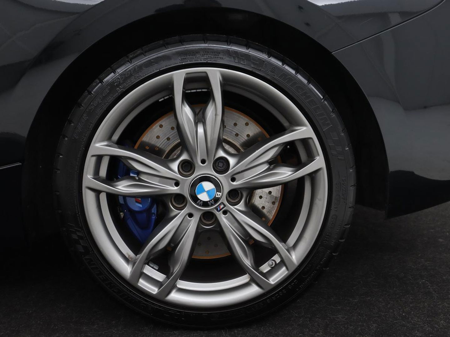 BMW 1-serie M140i High Executive | 2e eigenaar | Schuifdak | Leder | Harman/Kardon | Stoel & stuurverwarming | Camera | Carplay | Full LED | Navigatie