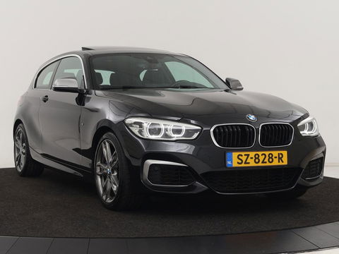 BMW 1-serie M140i High Executive | 2e eigenaar | Schuifdak | Leder | Harman/Kardon | Stoel & stuurverwarming | Camera | Carplay | Full LED | Navigatie
