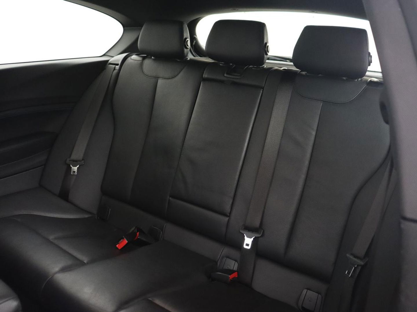 BMW 1-serie M140i High Executive | 2e eigenaar | Schuifdak | Leder | Harman/Kardon | Stoel & stuurverwarming | Camera | Carplay | Full LED | Navigatie