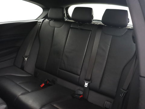 BMW 1-serie M140i High Executive | 2e eigenaar | Schuifdak | Leder | Harman/Kardon | Stoel & stuurverwarming | Camera | Carplay | Full LED | Navigatie