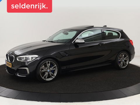 BMW 1-serie M140i High Executive | 2e eigenaar | Schuifdak | Leder | Harman/Kardon | Stoel & stuurverwarming | Camera | Carplay | Full LED | Navigatie