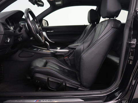 BMW 1-serie M140i High Executive | 2e eigenaar | Schuifdak | Leder | Harman/Kardon | Stoel & stuurverwarming | Camera | Carplay | Full LED | Navigatie