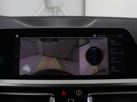 BMW 3-serie 330e Sport Line | Head-Up | LaserLight | Stoelverwarming | Trekhaak | 360 Camera | Adaptive cruise | Sportstoelen | Keyless | Live Cockpit | Carplay | Half leder | Navigatie