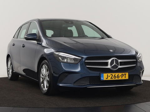 Mercedes-Benz B-Klasse 180 Advantage | Stoelverwarming | Camera | Carplay | Trekhaak | Full LED | Navigatie | Half leder | Climate control | Park Assist