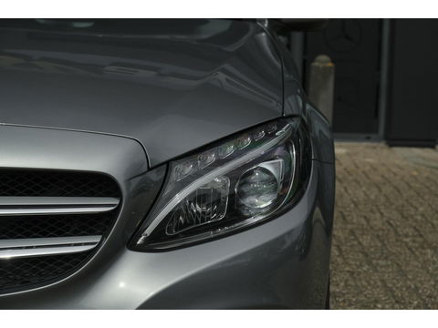 Mercedes-Benz C-Klasse Estate C200 184pk Automaat Ambition Leder Navigatie Camera Trekhaak Elektrische klep 17" LMV