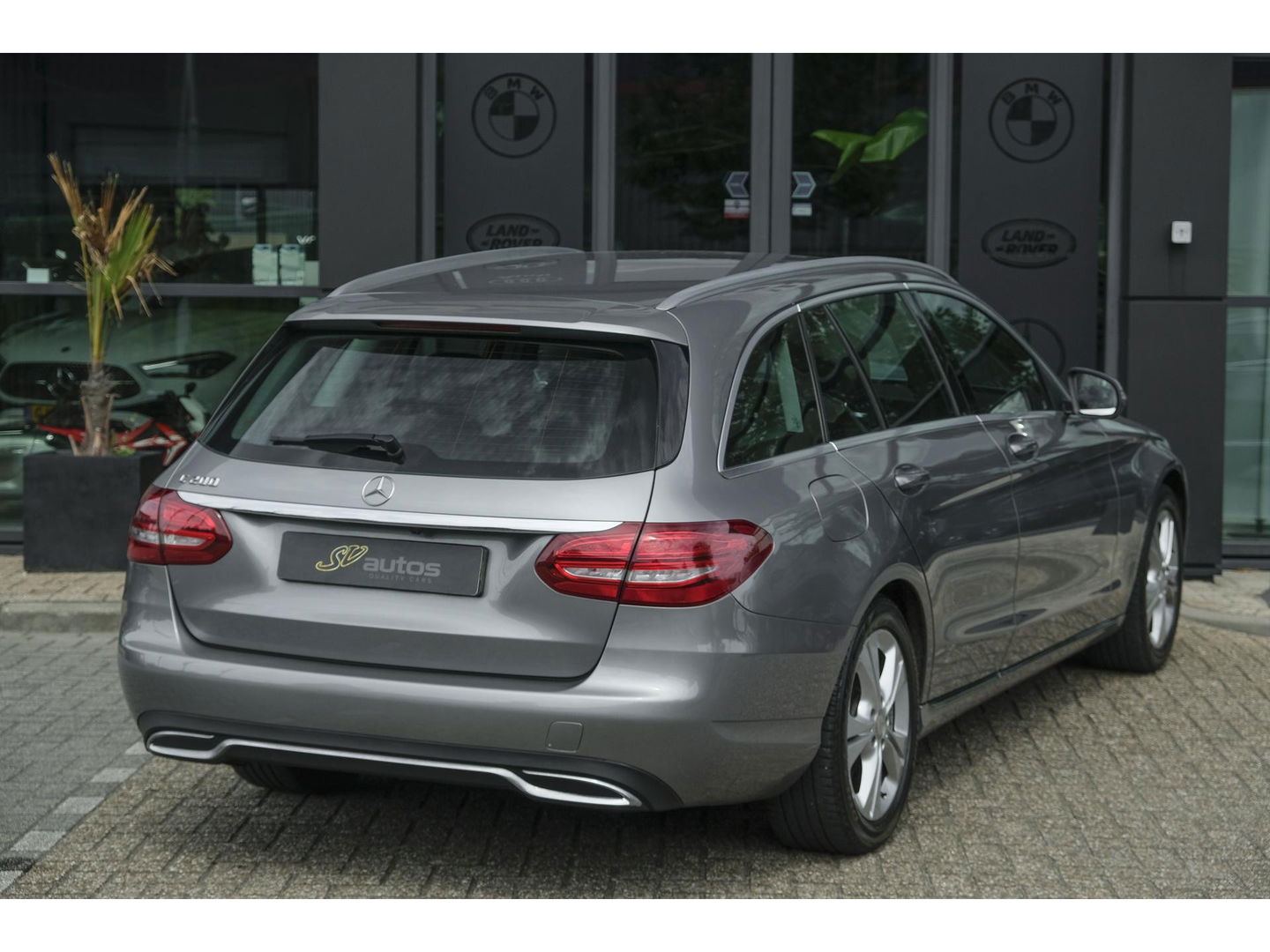 Mercedes-Benz C-Klasse Estate C200 184pk Automaat Ambition Leder Navigatie Camera Trekhaak Elektrische klep 17" LMV
