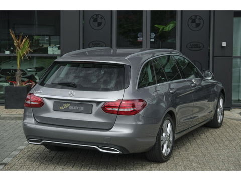 Mercedes-Benz C-Klasse Estate C200 184pk Automaat Ambition Leder Navigatie Camera Trekhaak Elektrische klep 17" LMV