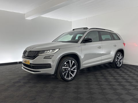 Škoda Kodiaq 1.5 TSI Sportline Business Aut. *PANO | LEATHER-ALCANTARA | FULL-LED | MEMORY-PACK | CANTON-SOUND | CAMERA | KEYLESS | DIGI-COCKPIT | SPORTSEATS | DAB+ | AMBIENT-LIGHT | CARBON | TOWBAR | 20''ALU*