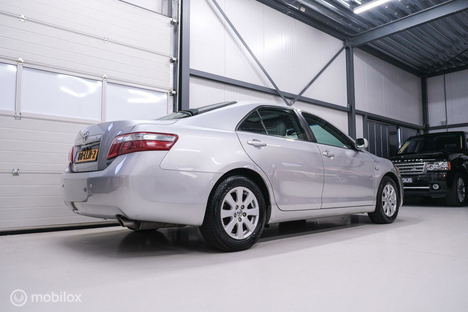 Toyota Camry 2.4 Hybrid automaat | Schuifdak | youngtimer | leder | Camera | Navigatie | DAB |