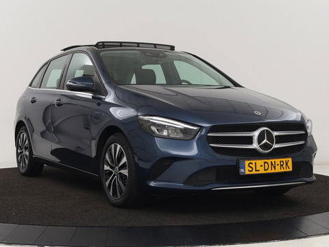 Mercedes-Benz B-Klasse 250e Style | Stoelventilatie | Panoramadak | Massage | Leder | Trekhaak | Carplay | Adaptive cruise | Stuurverwarming | Widescreen | Park Assist | Camera | Navigatie | Memory | PHEV | Plug In