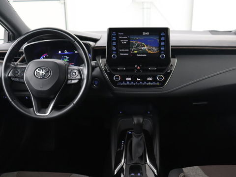 Toyota Corolla 1.8 Hybrid Trek | Stoelverwarming | Adaptive cruise | Carplay | Camera | Keyless | Full LED | Navigatie | Climate control