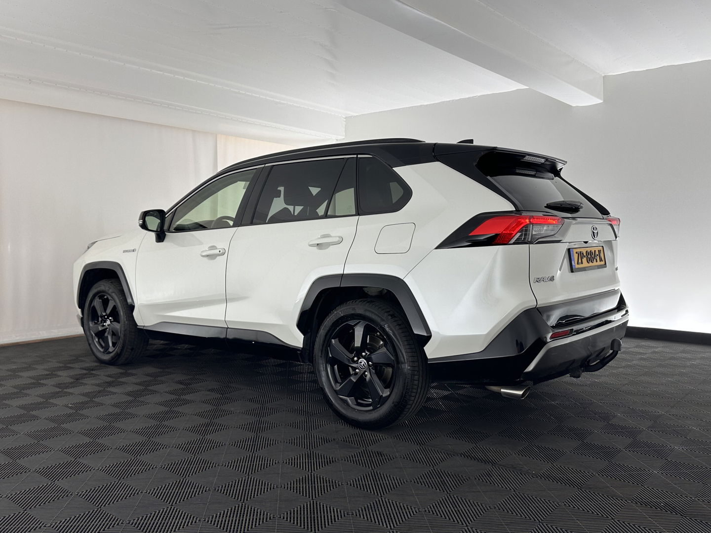 Toyota RAV4 2.5 Hybrid AWD Bi-Tone (INCL.BTW) *LEATHER | FULL-LED | ADAPTIVE-CRUISE | BLINDS-SPOT | TOP-VIEW | JBL-SOUND | KEYLESS | NAVI-FULLMAP | DAB+ | 18''ALU | TOWBAR*
