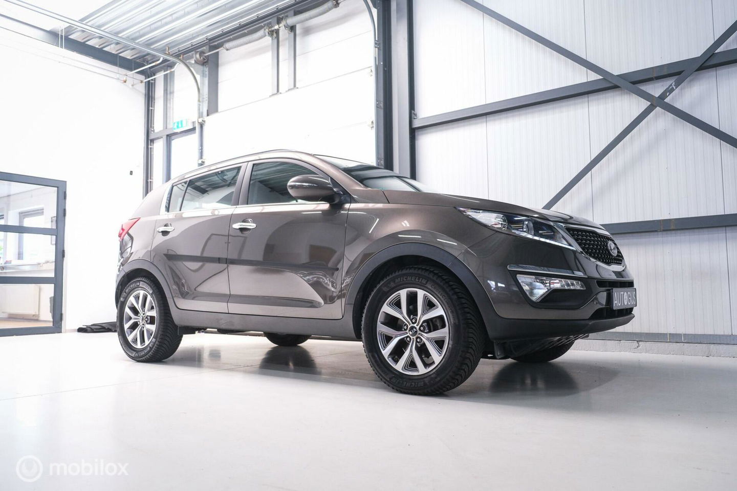 Kia Sportage 1.6 GDI BusinessLine | Trekhaak | Navigatie | Bluetooth | NL auto NAP | All season banden |